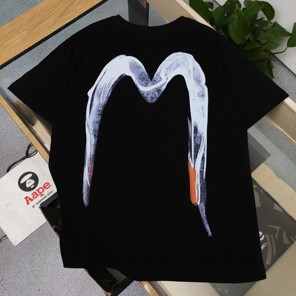 Kaos Distro EVISU  Pria Wanita d Baju Boxy Fit T Shirt - Official Merchandise