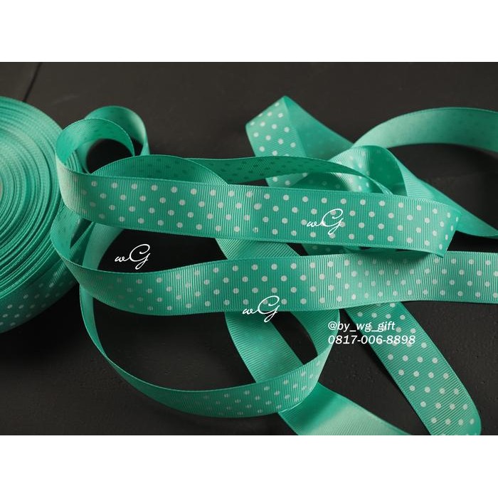 

Pita Grossgrain Tosca - Polkadots Putih; Lebar 2.5 cm; Panjang 50 yard