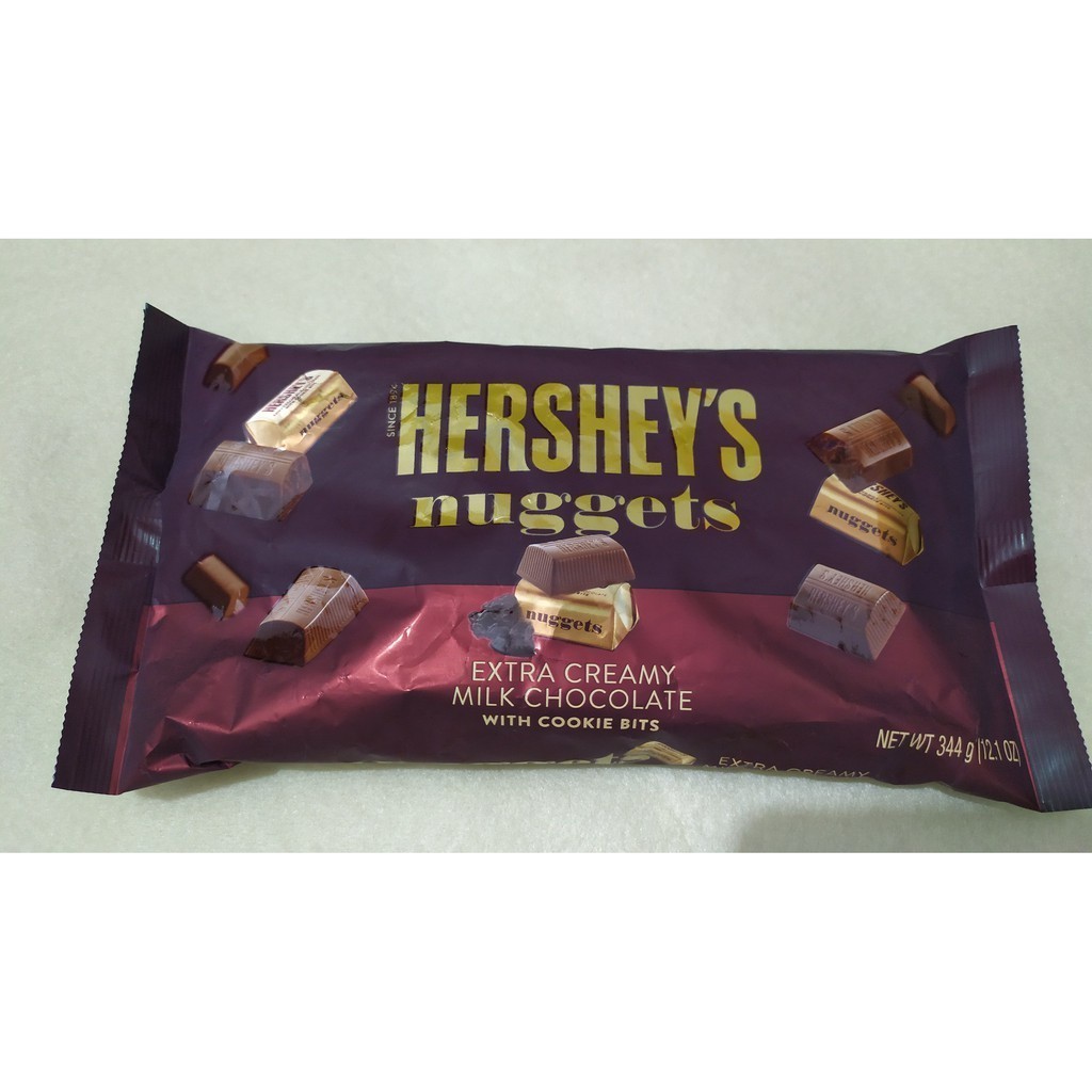 

Cokelat HERSHEYS Nuggets Extra Creamy Milk Chocolate Cookie Bits 344gram