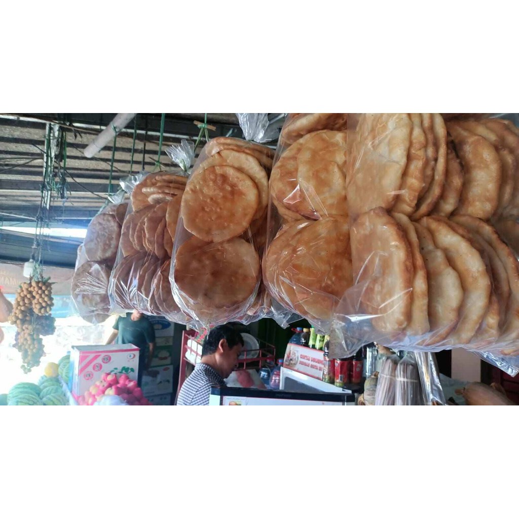 

Opak ketan per kantong 450gram siap makan cocok untuk teman makan atau kerupuk toping makan