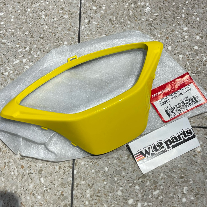 COVER GARNIS LIST SPEEDOMETER SUPRA X125 X 125 KUNING ORIGINAL AHM 53207 KVL N01PFY