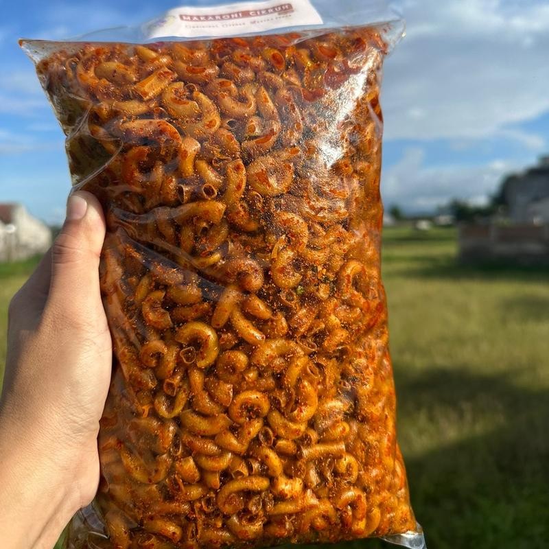 

1 KG MAKARONI CIKRUH DAUN JERUK - CEMILAN SARTIKA Camilan Pedas