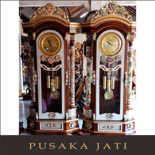 Almari jam jati lemari jam mewah pusaka jati jepara