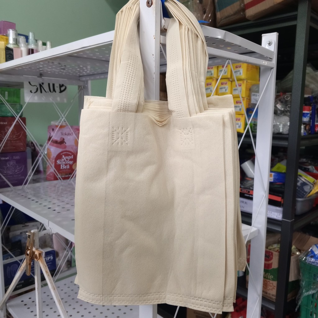 

1 Lusinan isi 12 Tas Kain Spunbond Goodie Bag Handle / Kantong Belanja / Tas Jinjing / Tas Bingkisan Size Kecil - Krem