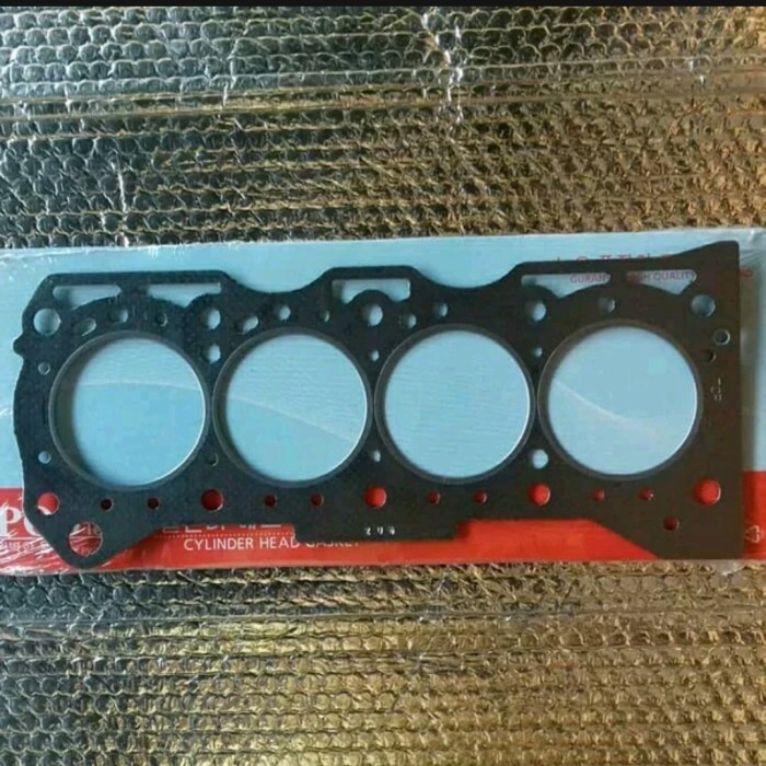gasket cylinder head paking deksel futura 1.3 cc BARU