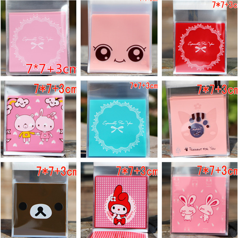 

50pcs 7*7cm Christmas Cartoon Candy Bags Self-adhesive Plastic Cookie Bag Xmas New Year Snack Package Gift Bags Kids Favors