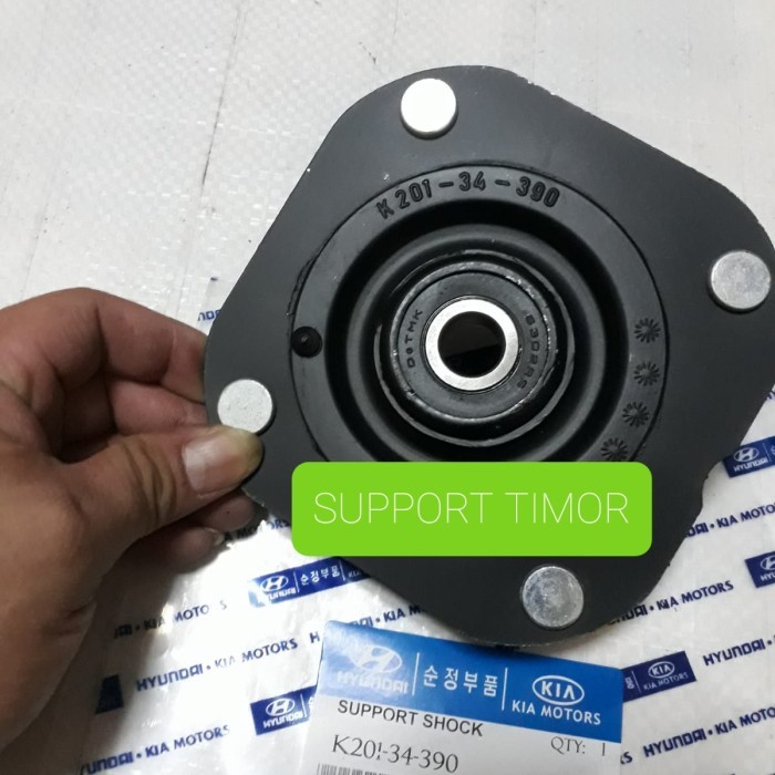 SUPPORT SHOCK DEPAN TIMOR ORIGINAL OEM