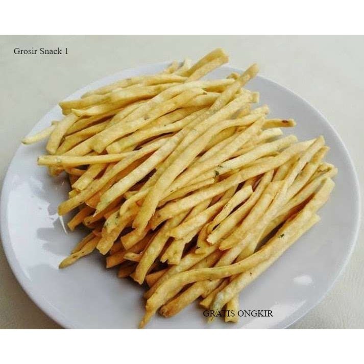 

NEW TERLARIS TERBARU stik bawang 1 kg stick bawang 1 kg stik bawang gurih renyah sistik bawang kue bawang 1kg siap kirim