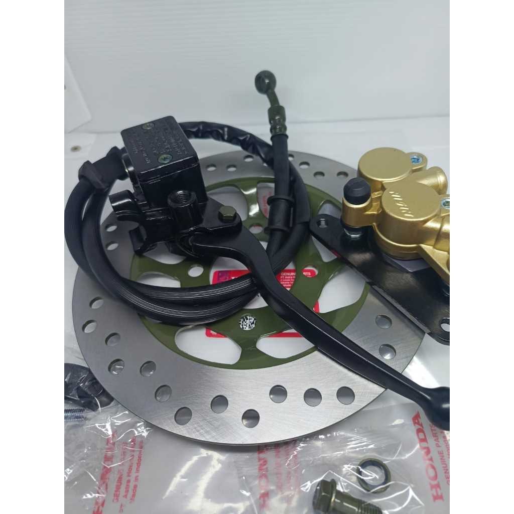 CAKRAM SET ASSY DEPAN KALIPER PALA BABI SUPRA X 125 , SUPRA FIT NEW, KHARISMA ORIGINAL NISSIN