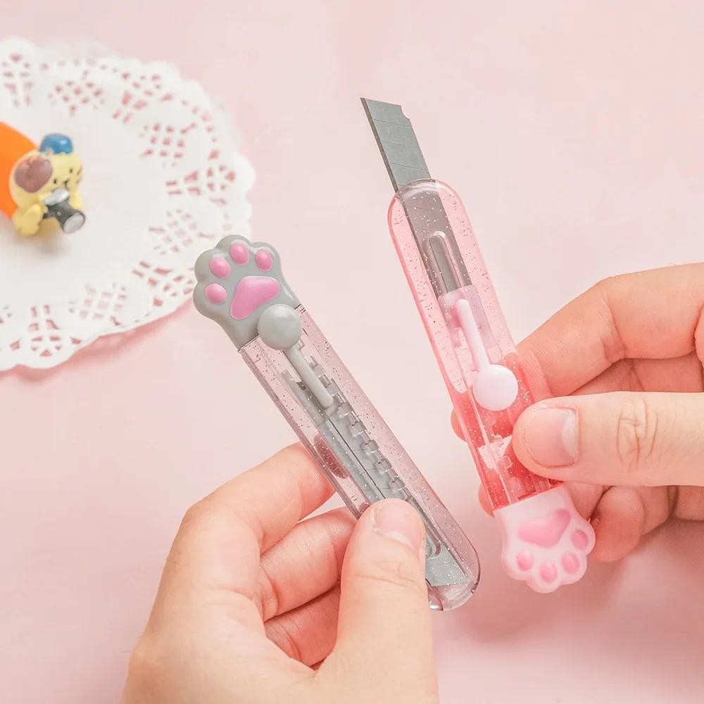 

Kawaii Transparent glitter Cat Paw Art Utility Knife Mini Express Box Knife Handwork Paper Cutter Refillable Blade Stationery