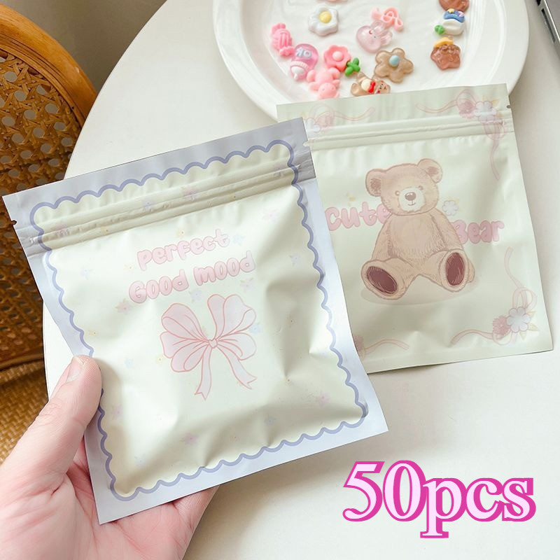 

50pcs Set Plastik Ziplock Bear Lucu Organizer Multifungsi Snack Aksesoris Sealed Bag Kawaii Travel Size untuk Kue Candy dan Souvenir