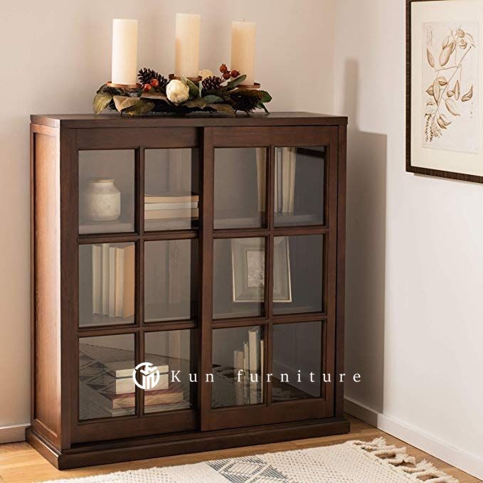 Almari rak buku minimalis kayu jati pintu geser kaca