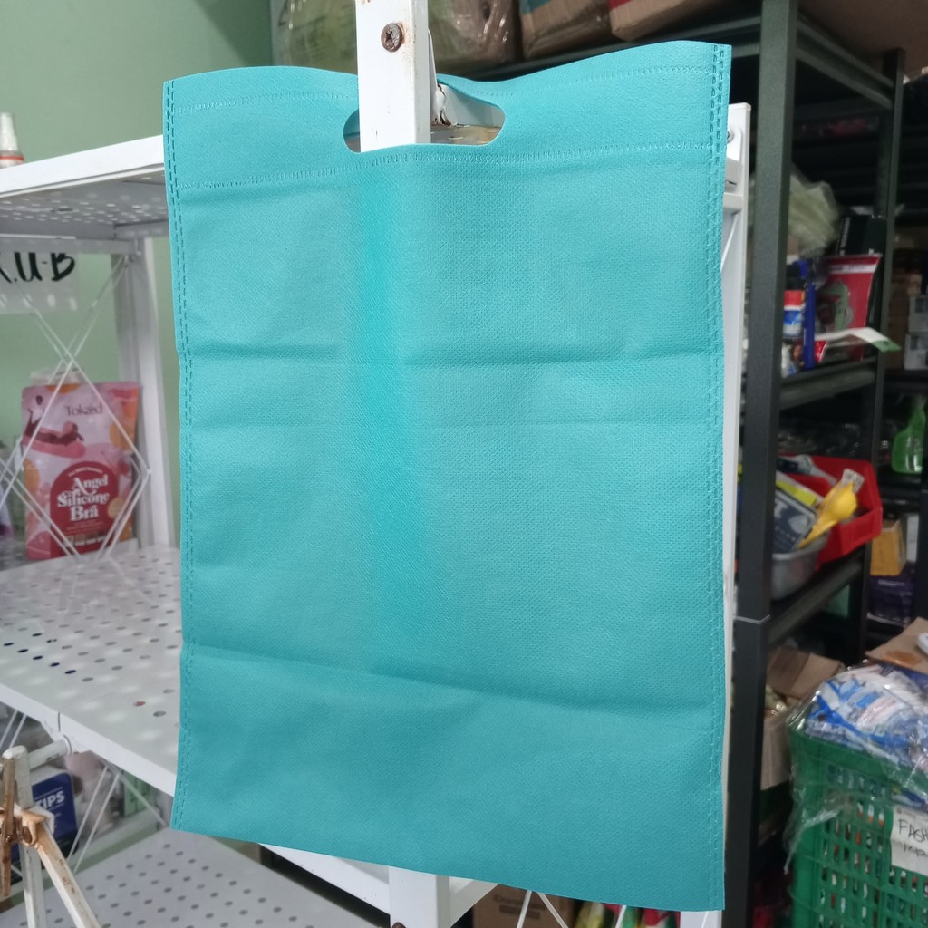 

Goodie Bag Tas Belanja Spunbond Model Oval Dcut 25x35 (Tosca)