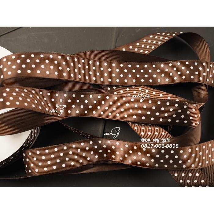 

Pita Grossgrain Coklat - Polkadots Putih ;Lebar 2.5 cm;Panjang 50 yard