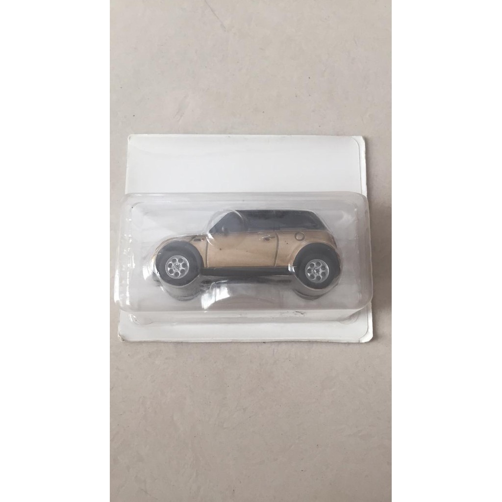 FG99 Tomica mini cooper limited edition gold color ban karet blister segel