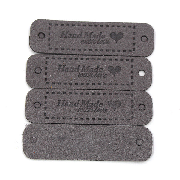 

20Pcs 56*15MM Cloth Handmade Label Embossed Tags for Clothes Flag Label Metal Spikes Garment Sewing Accessories