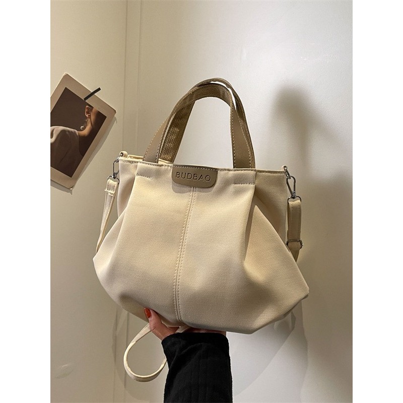 Tas Kanvas Baru Kapasitas Besar Tas Jinjing Tas Tangan untuk Bepergian