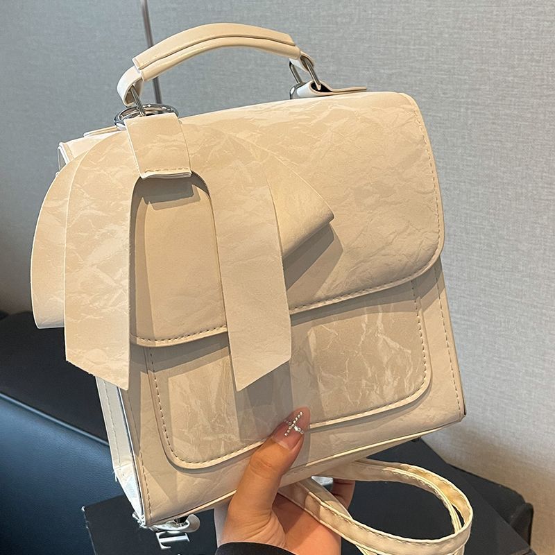 Busur ransel wanita 2025 musim fashion baru ransel perguruan tinggi tas serbaguna tas travel wanita