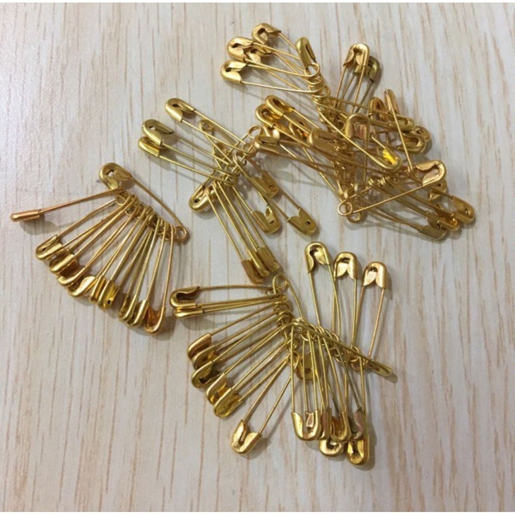 Peniti atau jarum berwarna emas Ps