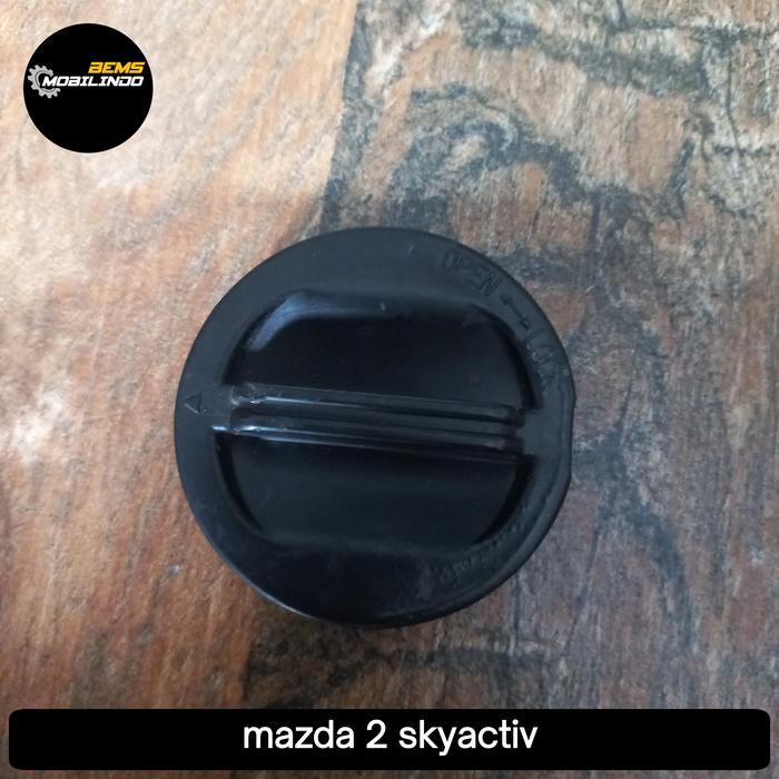 tutup lampu mazda 2 skyactiv
