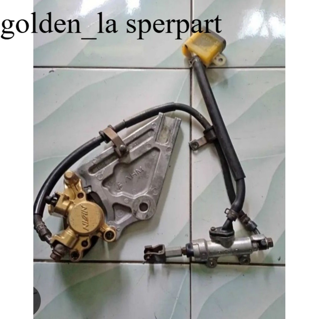 master rem belakang Supra X 125 original copotan