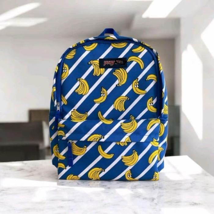 JanSport Tas Ransel Motif Pisang Biru dengan Garis Putih untuk Gaya Casual dan Fungsional