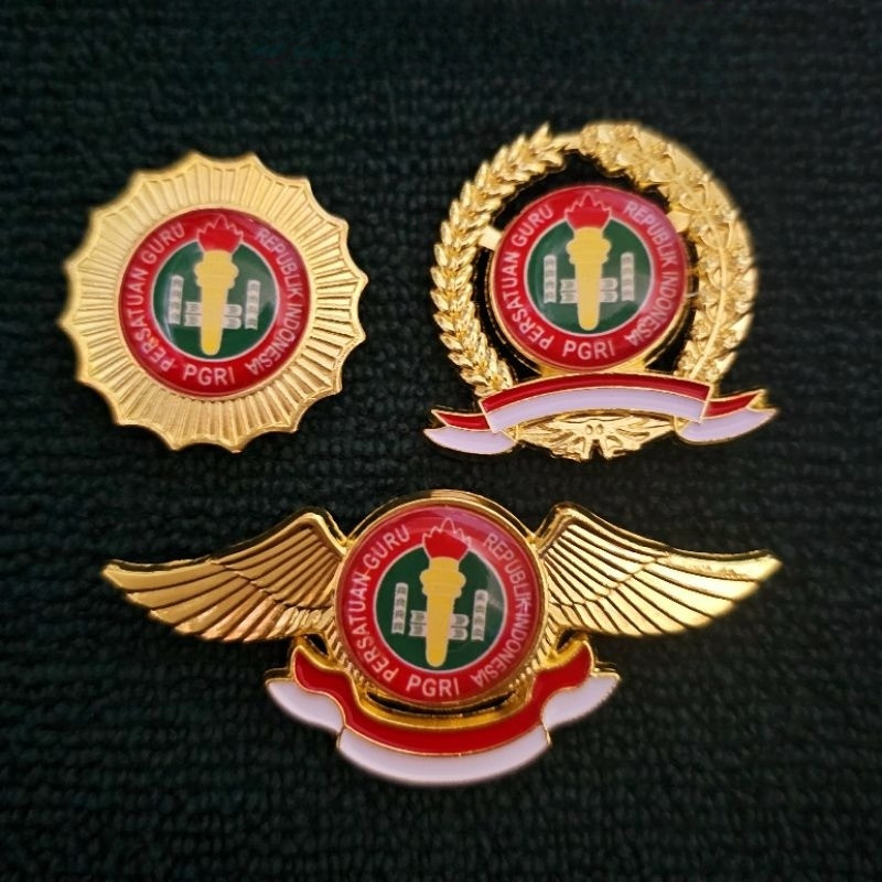 Pin PGRI Magnet Logam Kuningan Coating Resin