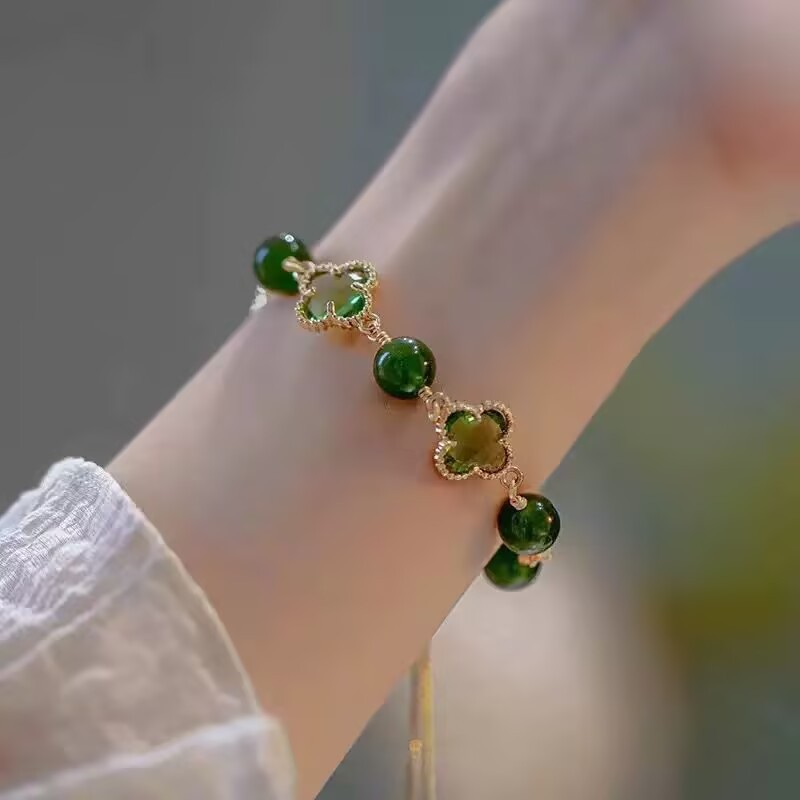 Gelang bunga empat daun baru, desain unik, gaya kuno baru, mempercantik warna kulit.