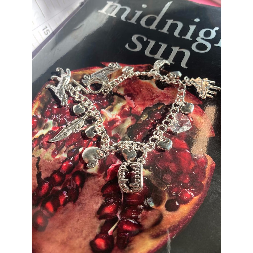 | Twilight-Inspired Charm Bracelet | Handmade Twilight Charm Bracelet | Bella's Wolf and Crystal Hea
