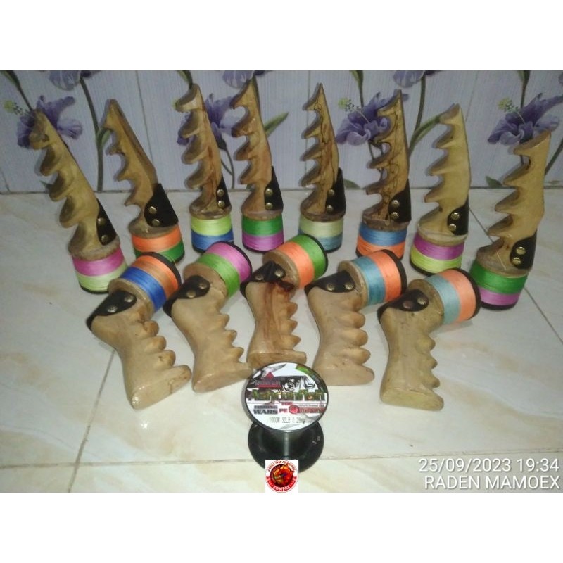 Gulungan manual ketapel ikan