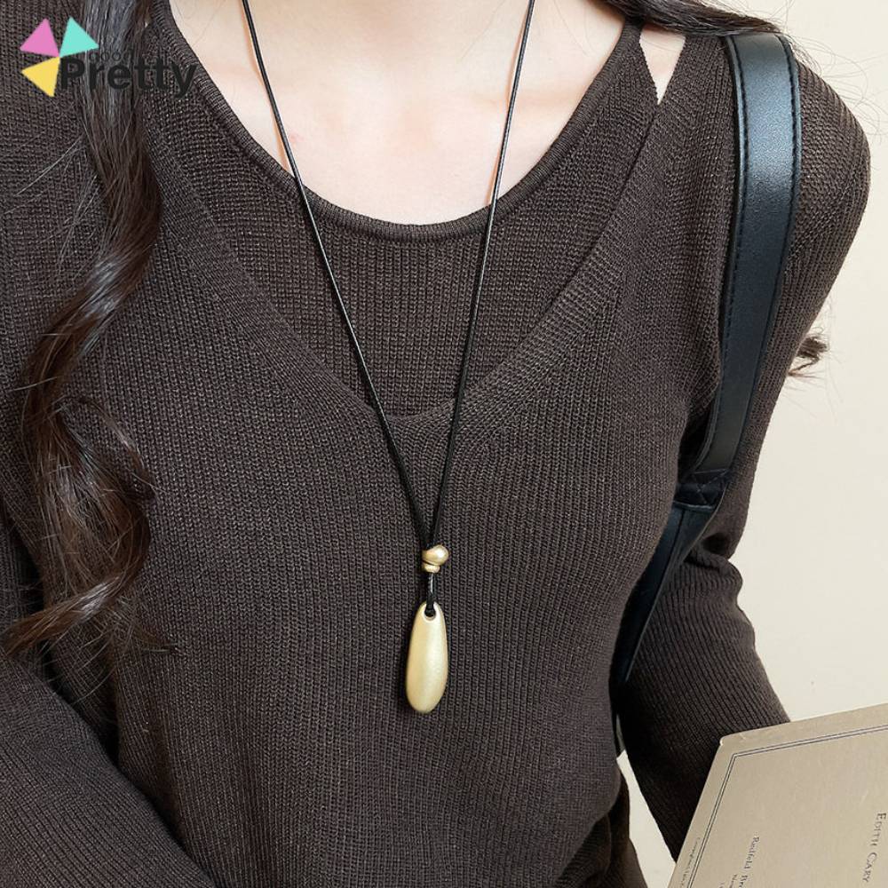 COD Kalung Tali Panjang Wanita Liontin Logam Emas Elips Tali Hitam Etnik Retro Gaya Minimalis Korea 