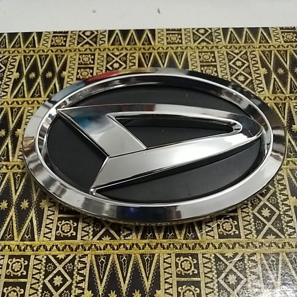 emblem logo gril depan mobil Xenia all New original
