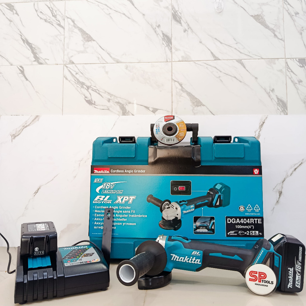 MESIN GERINDA GURINDA CAS BATERAI CORDLESS ANGLE GRINDER 4" 4 INCH 18V MAKITA DGA404RTE  Merk: Makit