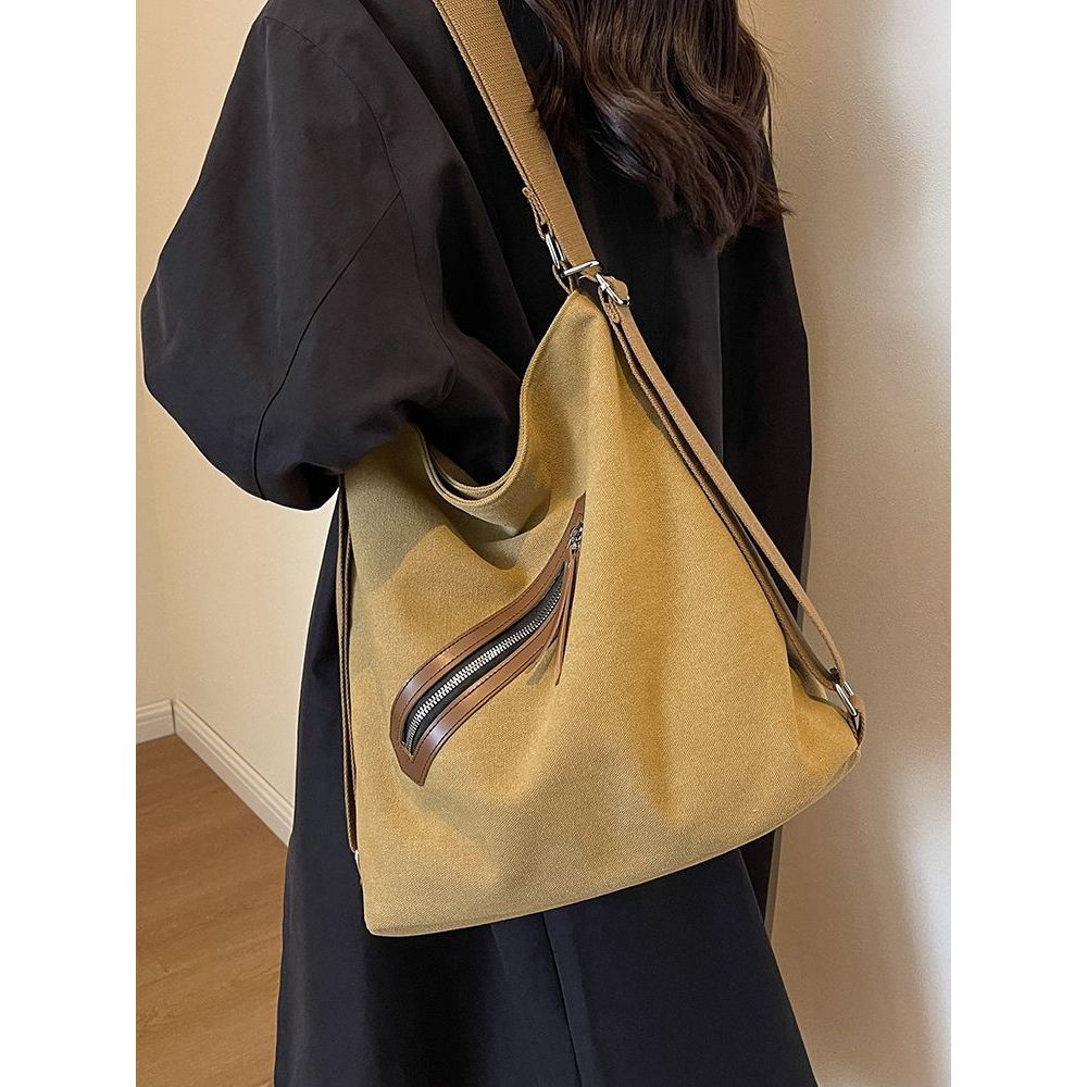 Tas besar komuter mode, tas bahu wanita, tas kanvas besar kapasitas, tas kanvas besar.