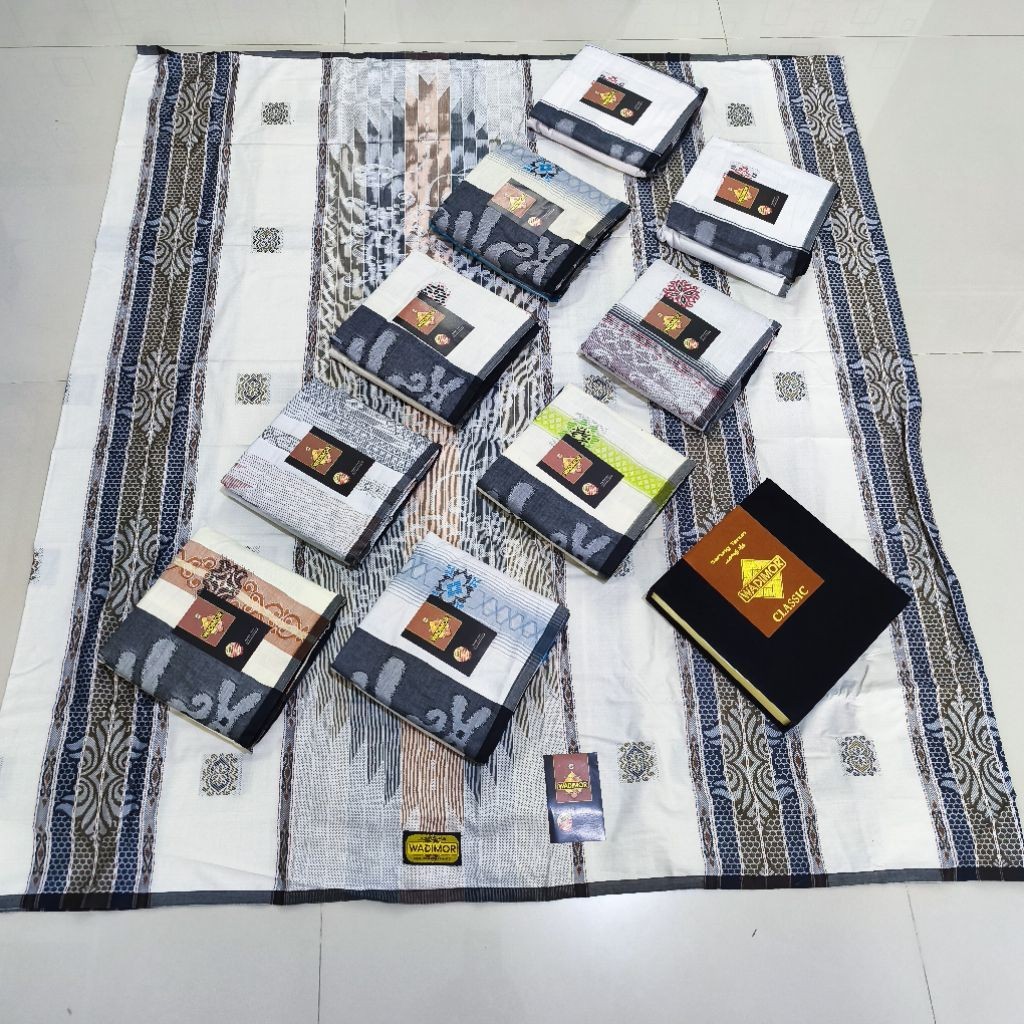 Sarung Wadimor Jacgiar Songket Motif Timbul Putih Hitam