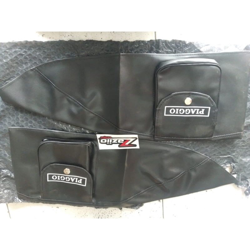 sarung tepong model tas bacaan piaggio garage vespa