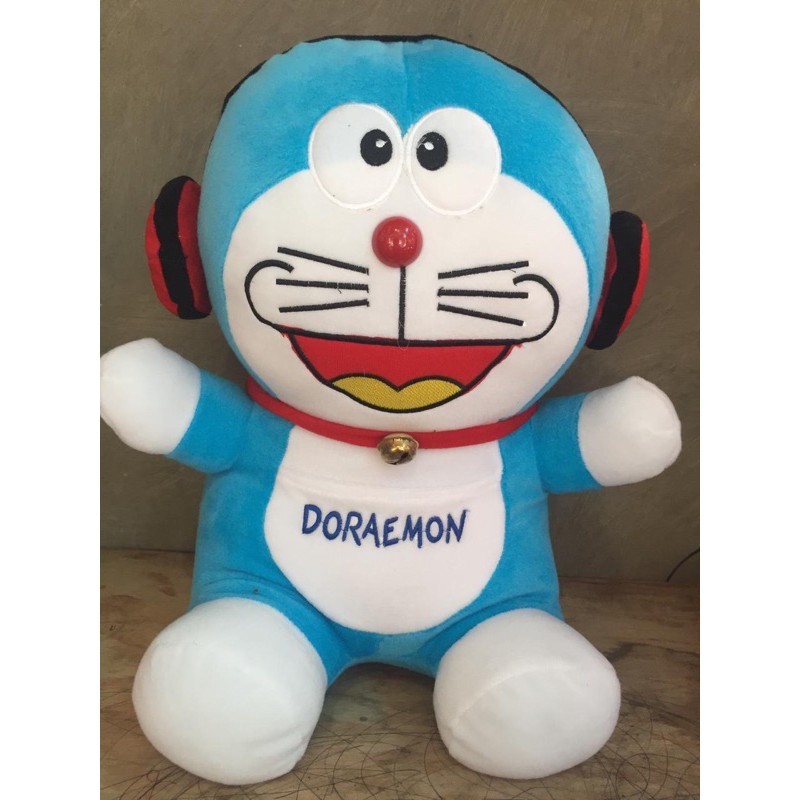 GEANT9D Promo Sale Terbesar/Boneka Doraemon Pakai Headset Hitam Ukuran 28cm Terbaru