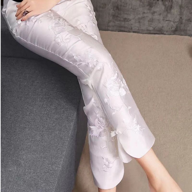 Wanita gaya Cina bordir bunga Tang pakaian celana celana ramping gesper celana