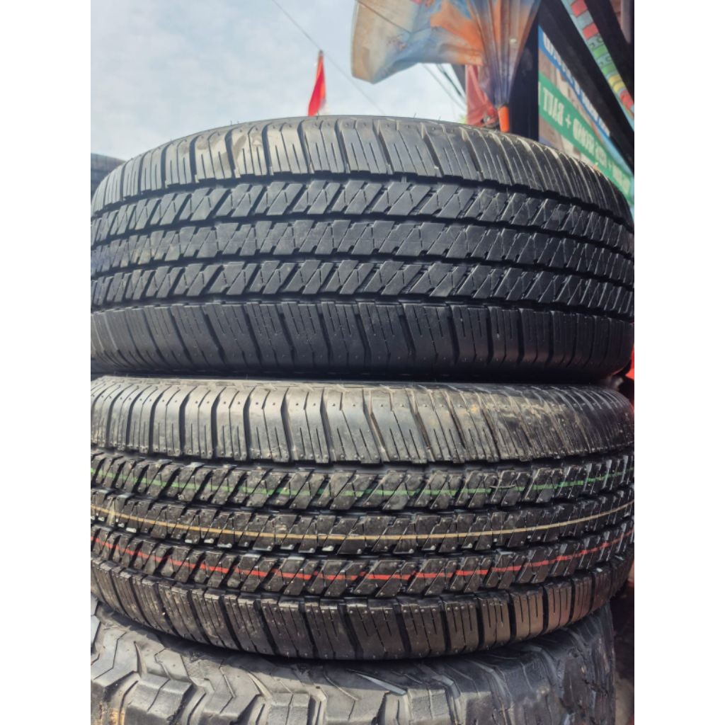 ban copotan Fortuner Pajero 265 60 18 Bridgestone dueler hl