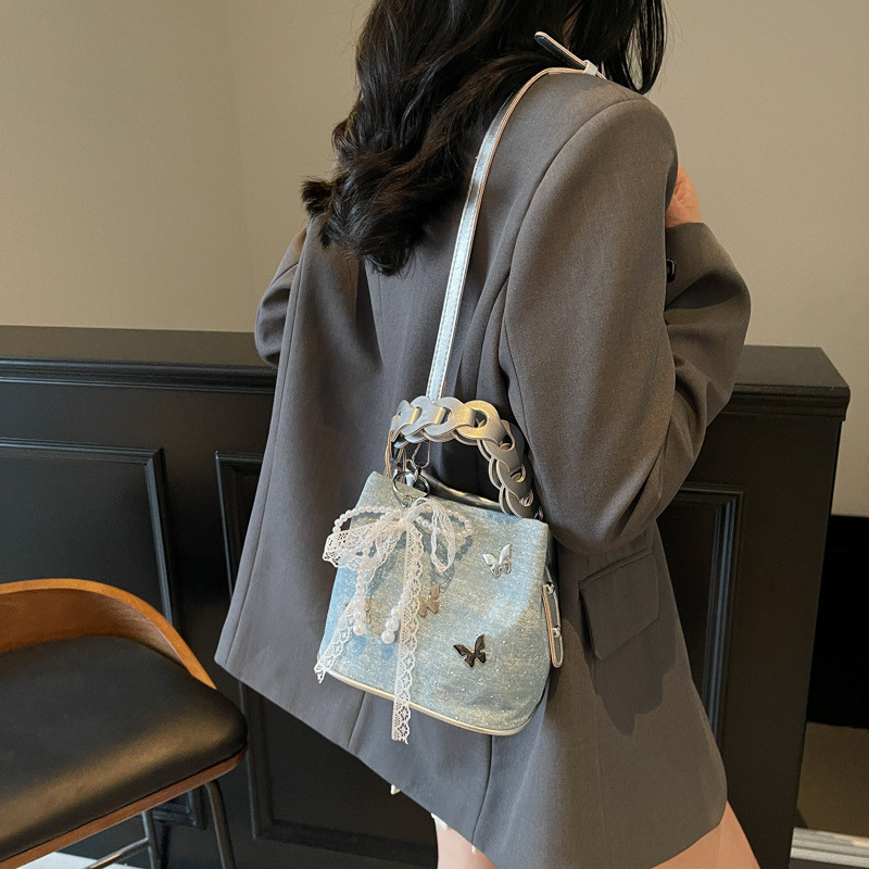 Tas selempang wanita, tas crossbody, model musim panas baru, tas ember dengan desain unik dan tali s