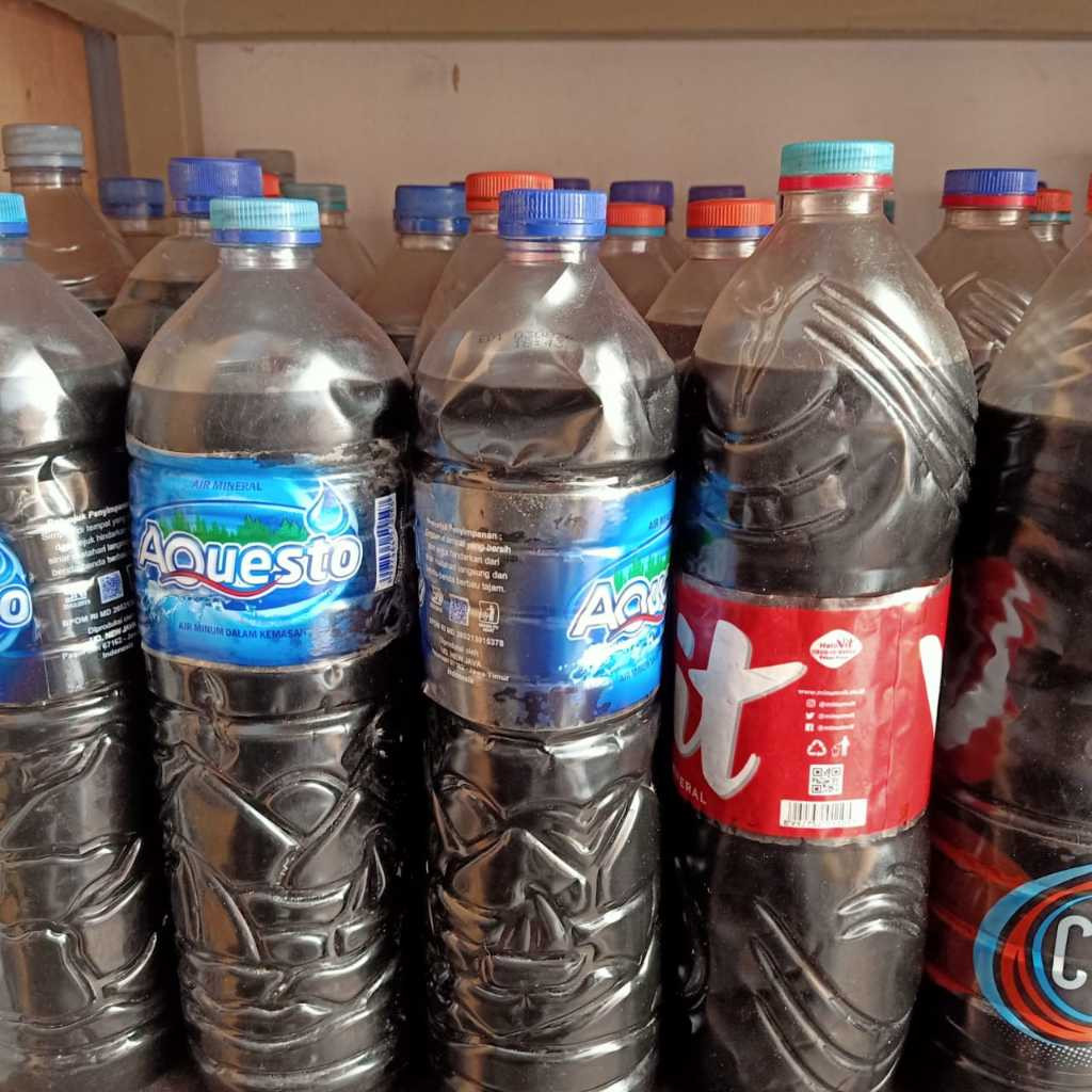 Oli Bekas Motor kemasan Botol Aqua 1.5 Liter (Oli Sumbon)