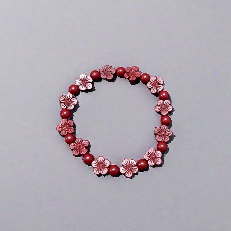 Bunga Pasir Plum Ungu Cinnabar Gelang Emas