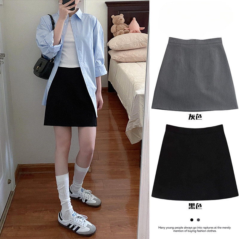 Rok mini/rok setengah panjang berpinggang tinggi berwarna hitam yang menonjolkan bentuk tubuh, menye