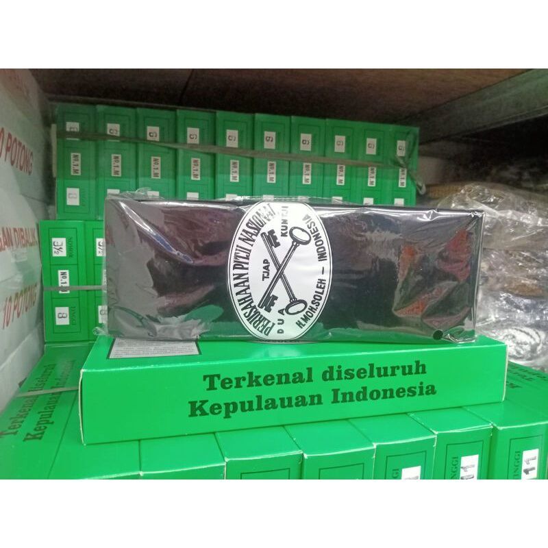 PECI  CAP DUA KUNCI ATAU SONGKOK NASIONAL