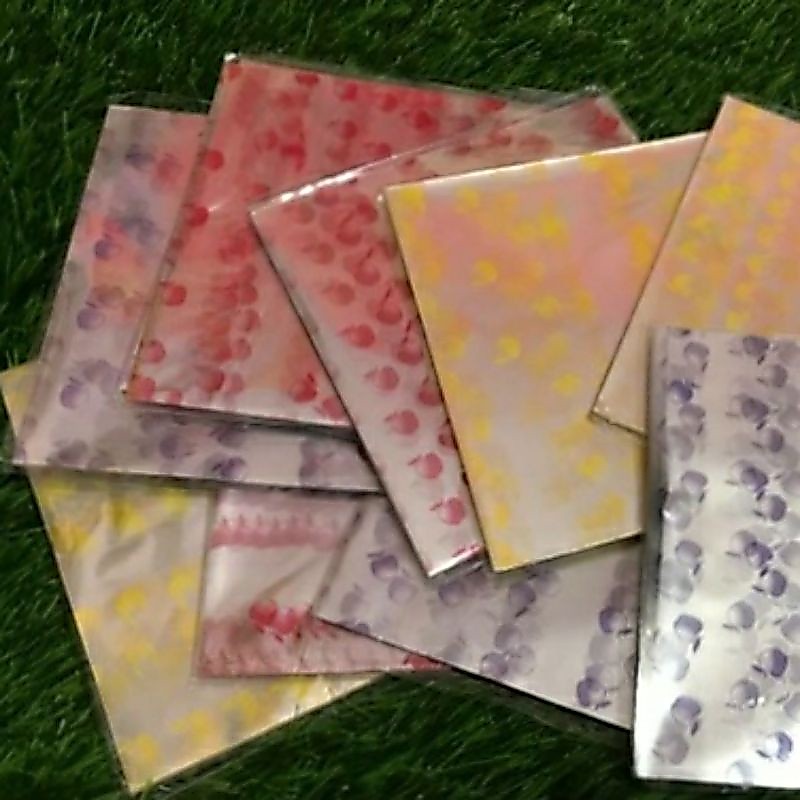 PLASTIK BUNGKUS MADUMONGSO/PLASTIK KACA BENING MOTIF/PLASTIK BUNGKUS JENANG UKURAN 13×13 CM