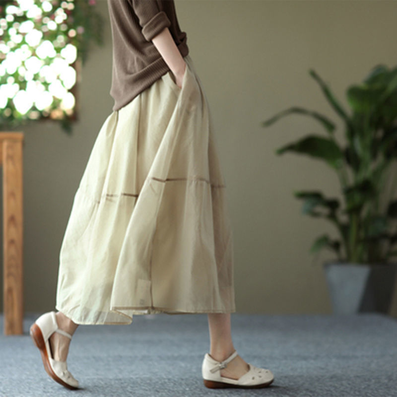 Rok organza dengan panel tulle serbaguna, panjang sedang, rok dengan ujung lebar.