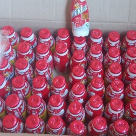 Milkuat botol 65ml isi 60pcs varian rasa jeruk/stroberi