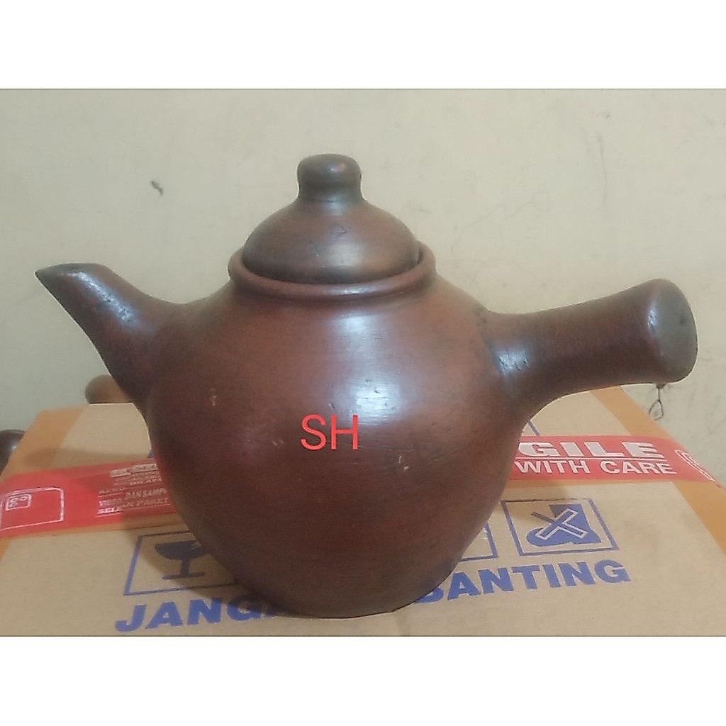 Poci Teko gerabah kecil gagang