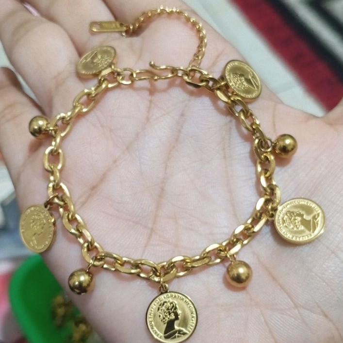 gelang titanium mainan motif koin