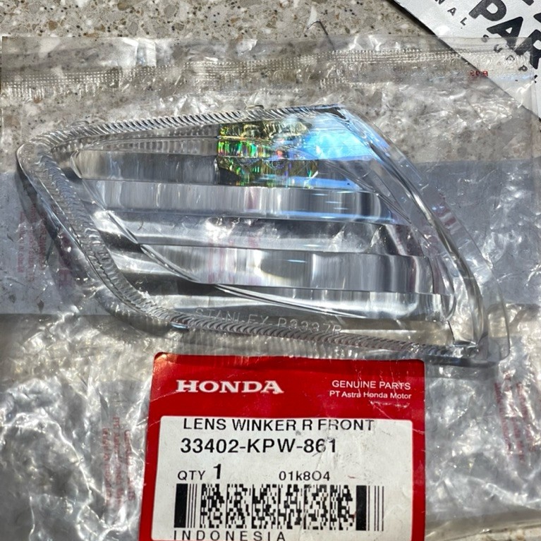 MIKA KACA LAMPU SEIN DEPAN KANAN KIRANA 125 ORIGINAL AHM 33402 KPW 861